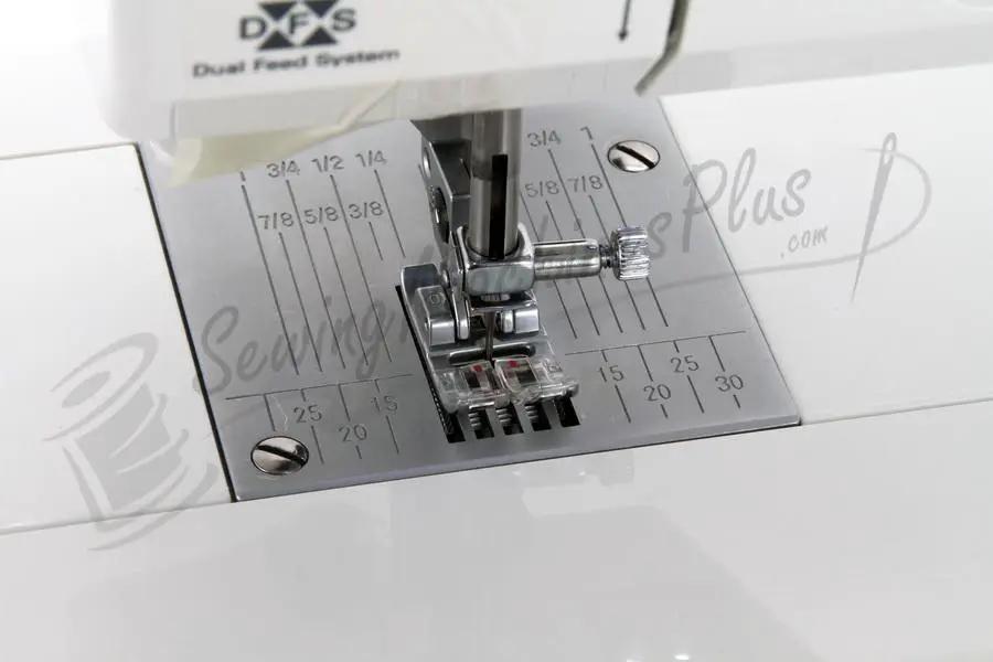 Pfaff Smarter C1100 Pro sewing machine; white body with metal needle plate and DFS Dual Feed System.