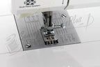 Pfaff Smarter C1100 Pro sewing machine; white body with metal needle plate and DFS Dual Feed System.