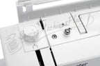 Pfaff Smarter C1100 Pro sewing machine in white with dials and controls.