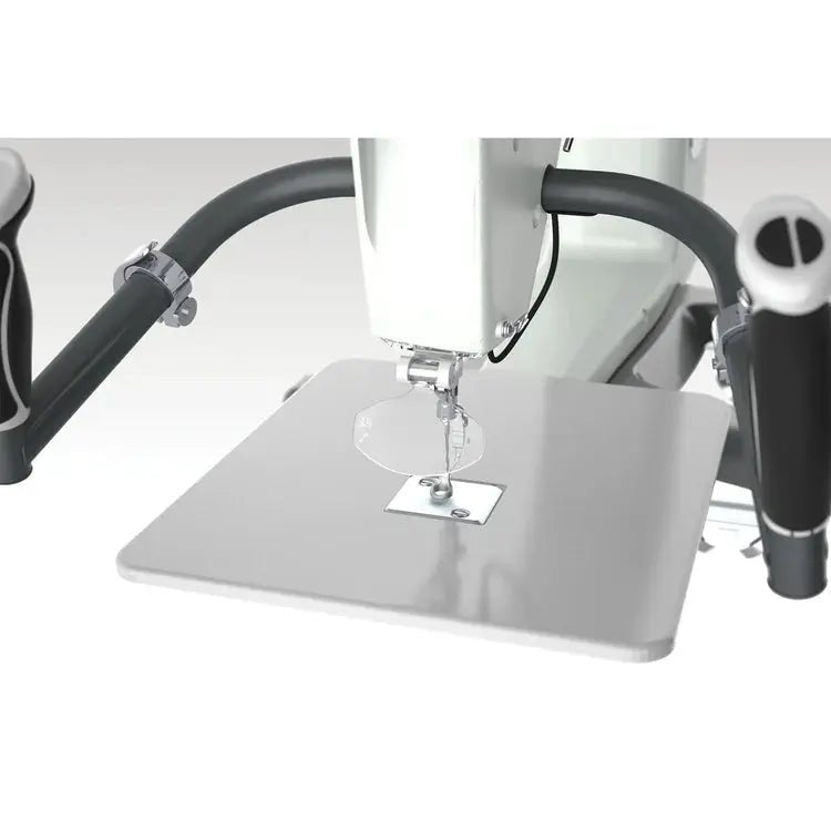 Q'nique 21 Ruler Base; metal base with circular acrylic ruler guide attached to quilting machine.