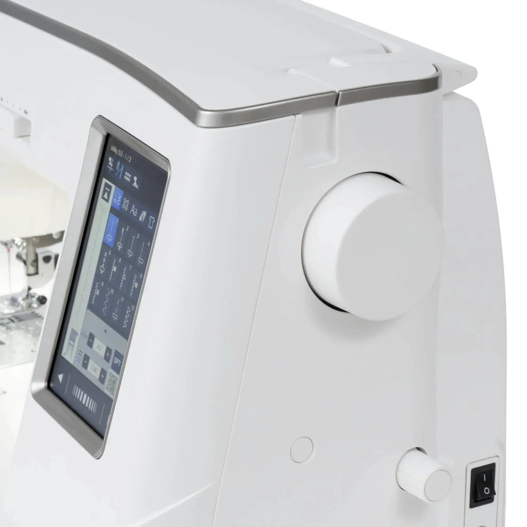 Janome Skyline 8 Sewing & Quilting Machine, white computerized model with touchscreen display.