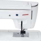 Janome Skyline 8 sewing and quilting machine; white computerized unit with red Janome branding.