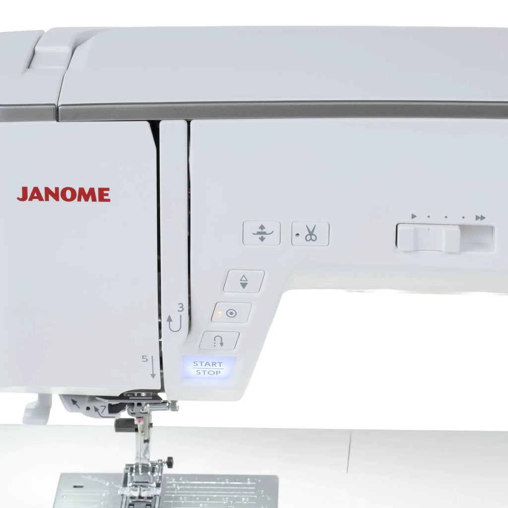 Janome Skyline 8 sewing and quilting machine; white, computerized with JANOME logo visible.
