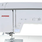 Janome Skyline 8 sewing and quilting machine; white, computerized with JANOME logo visible.