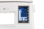 Janome Skyline 8 sewing and quilting machine, white computerized model with touchscreen interface.