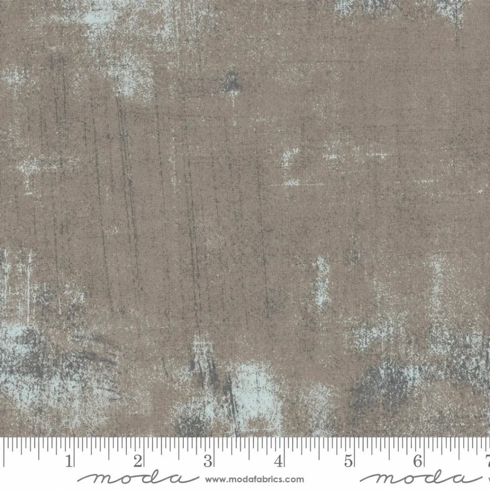 Moda Grunge Basics Grey 30150 156 cotton quilting fabric featuring a distressed grey tonal texture.