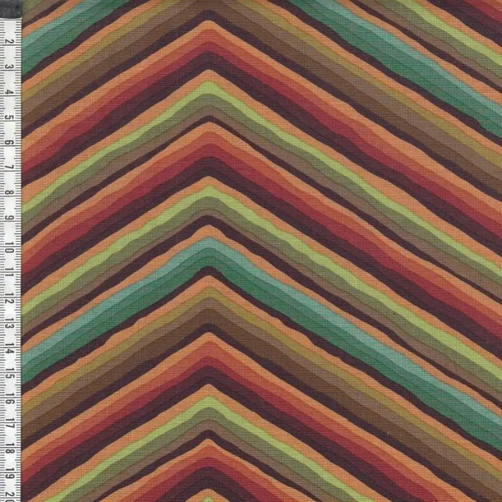 FreeSpirit Chevron Stripe Ochre PWGP090.OCHRE cotton quilting fabric by Kaffe Fassett featuring multicolored zigzag stripes in warm ochre, green, brown, and teal.