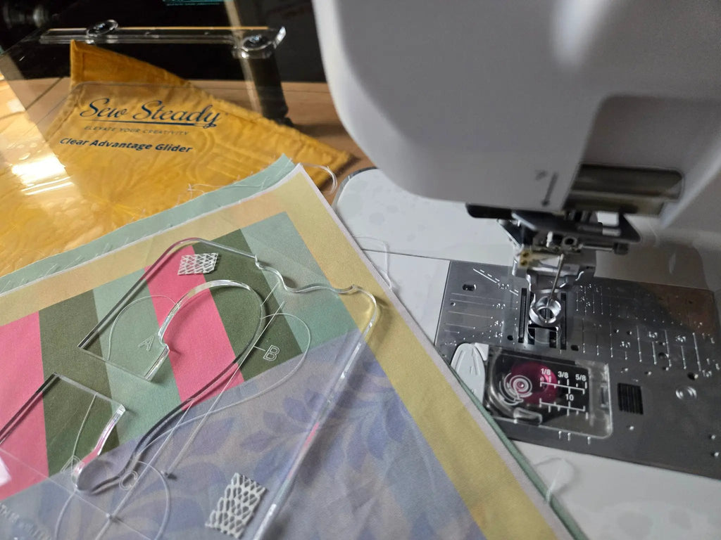 Sew Steady Clear Ruler Work Glider; clear acrylic grid rulers (A/B) beside a sewing machine