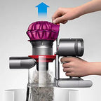 Dyson V7 Motorhead vacuum cordless handheld with purple cyclone and clear dustbin.