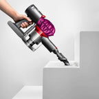 Dyson V7 Motorhead cordless vacuum handheld with purple cyclone and gray body