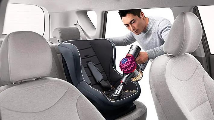Dyson V7 Motorhead cordless vacuum for cars, cleans seats and floor mats.