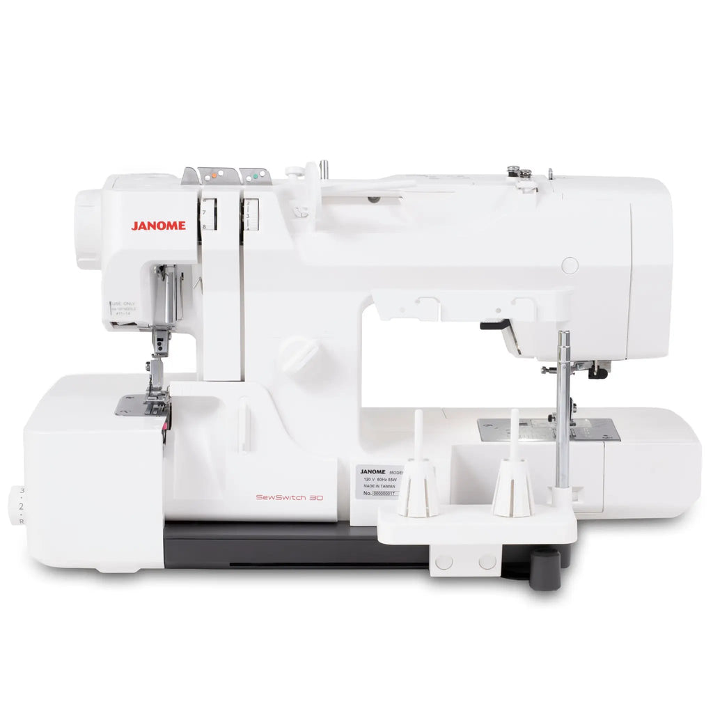 Janome SewSwitch 30 sewing and overlocker comb machine, white with visible presser feet.