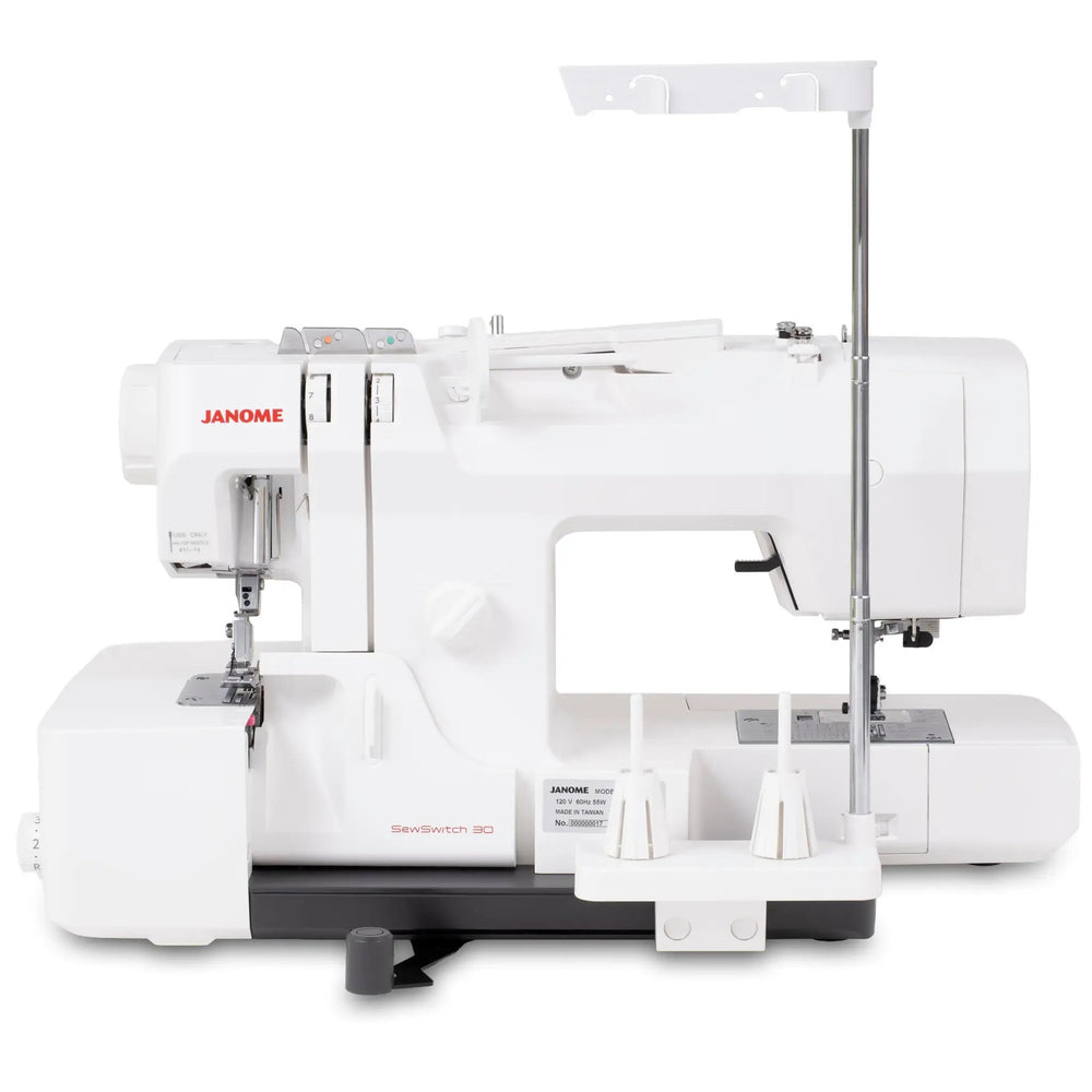 Janome SewSwitch 30 sewing and serger combination machine, white, with metal stand