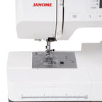Janome SewSwitch 30 sewing and overlocker combi machine, white body with visible needle area and ruler bed