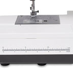 Janome SewSwitch 30 sewing and overlocker combi machine with built-in ruler on the base