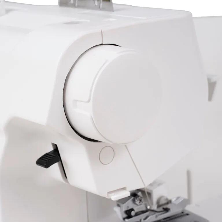 Janome SewSwitch 30 sewing machine control dial on a white body