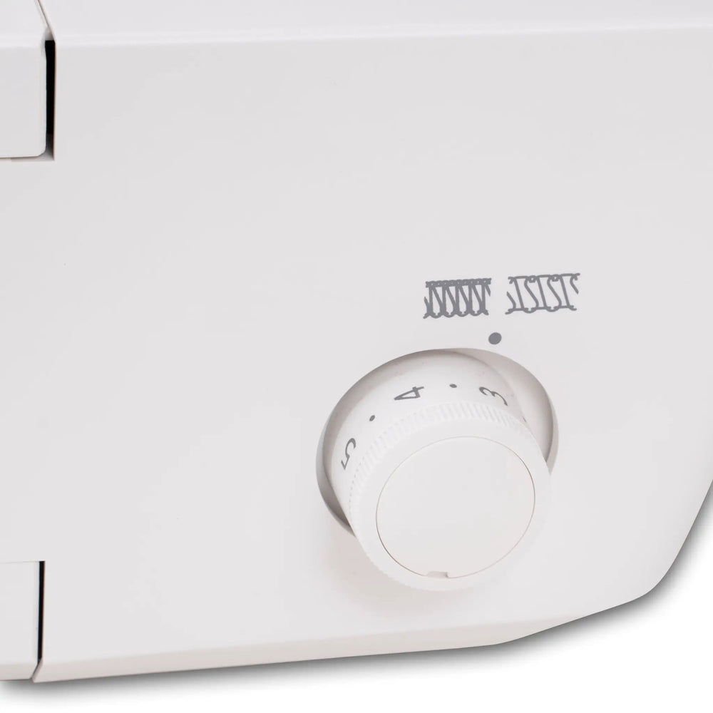 Janome SewSwitch 30 sewing machine box with a large white dial knob