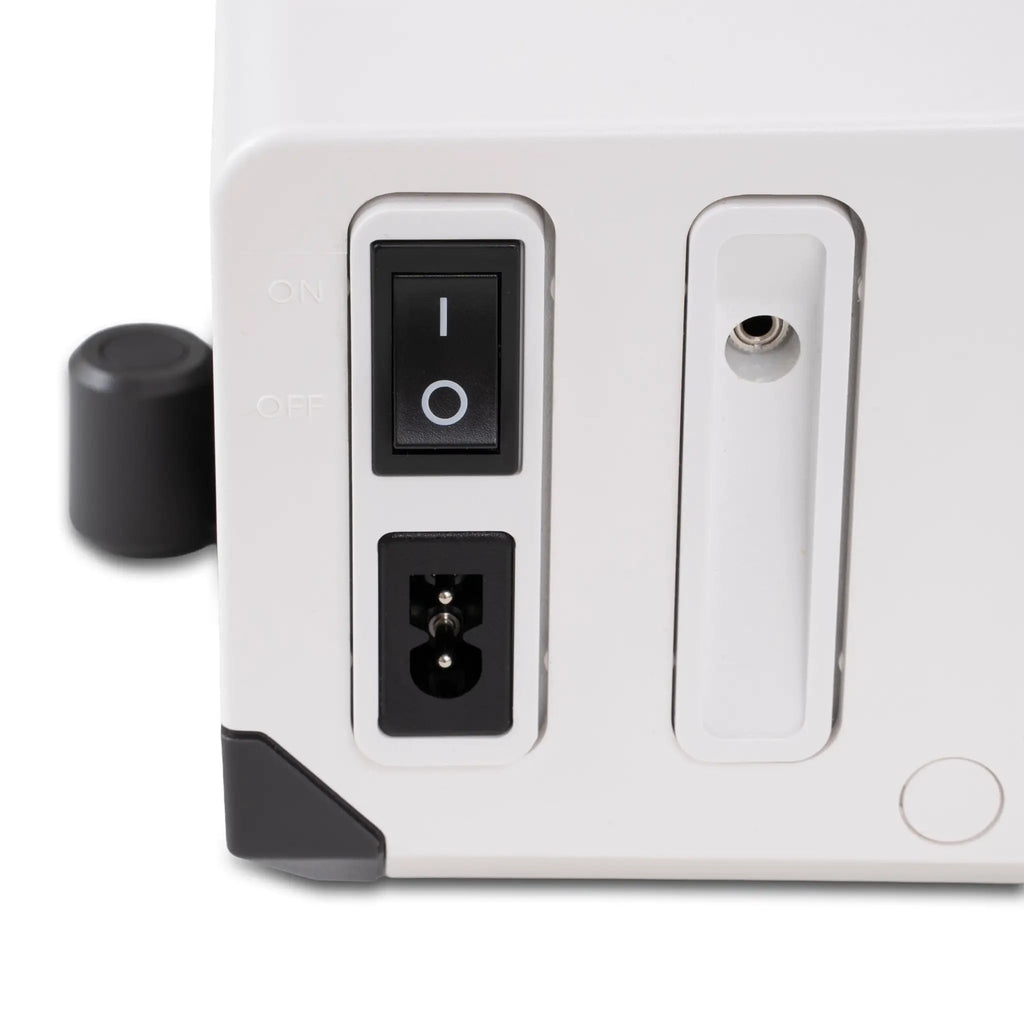Janome SewSwitch 30 sewing and overlocker combi machine, white body with black power switch.