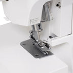 Janome SewSwitch 30 sewing & overlocker combo; close-up of needle, presser foot and stitch plate