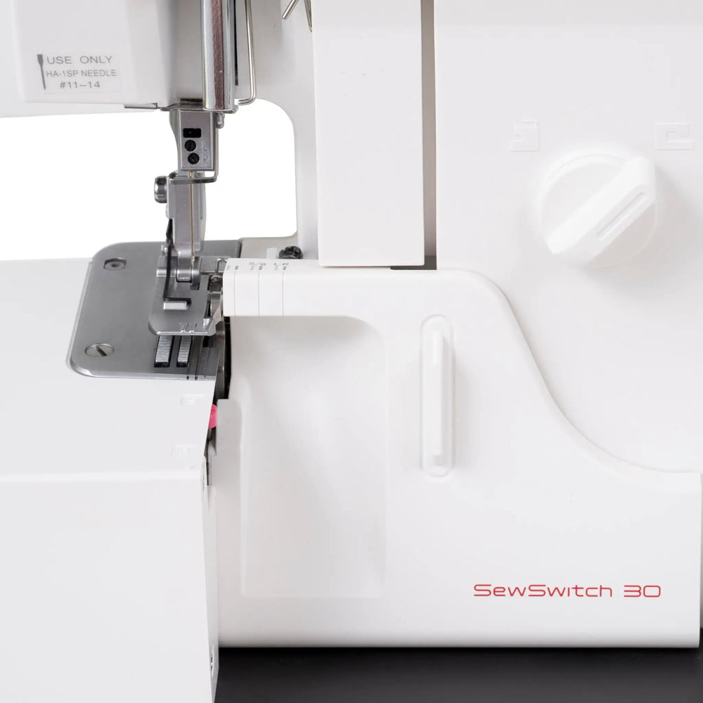 Janome SewSwitch 30 sewing & overlocker combi machine, white body with red SewSwitch 30 logo