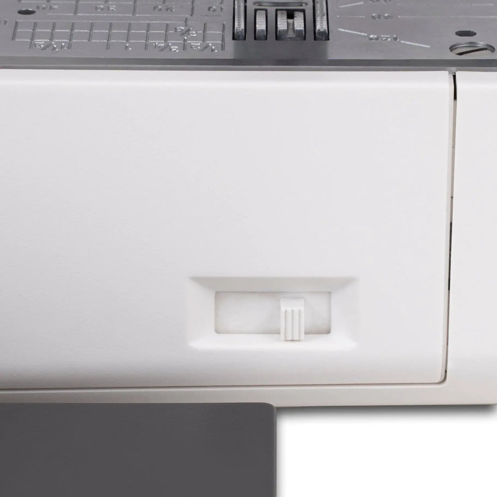 Janome SewSwitch 30 sewing and overlocker combi machine, white body with gray top plate