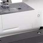 Janome SewSwitch 30 sewing machine; gray body with metal needle plate and presser foot