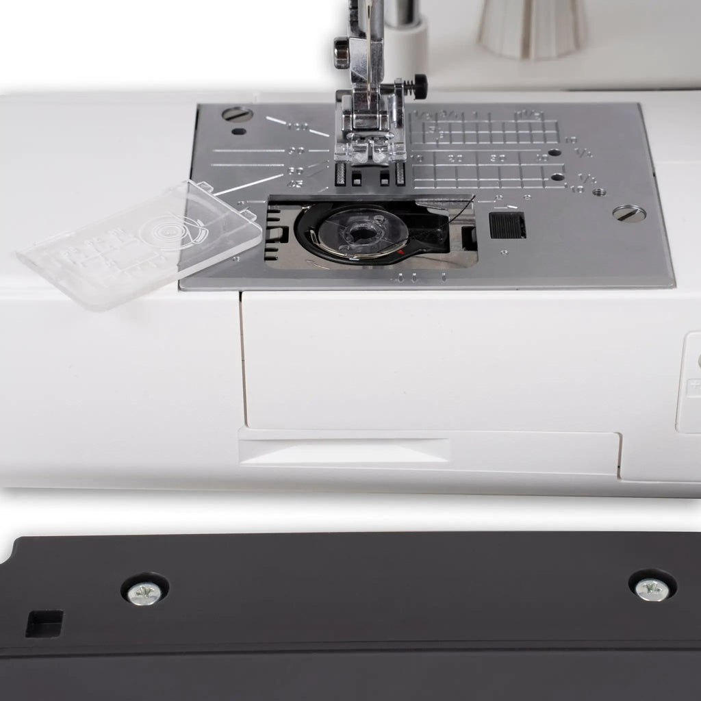 Janome SewSwitch 30 sewing & overlocker combi machine; close-up of metal needle plate and presser foot