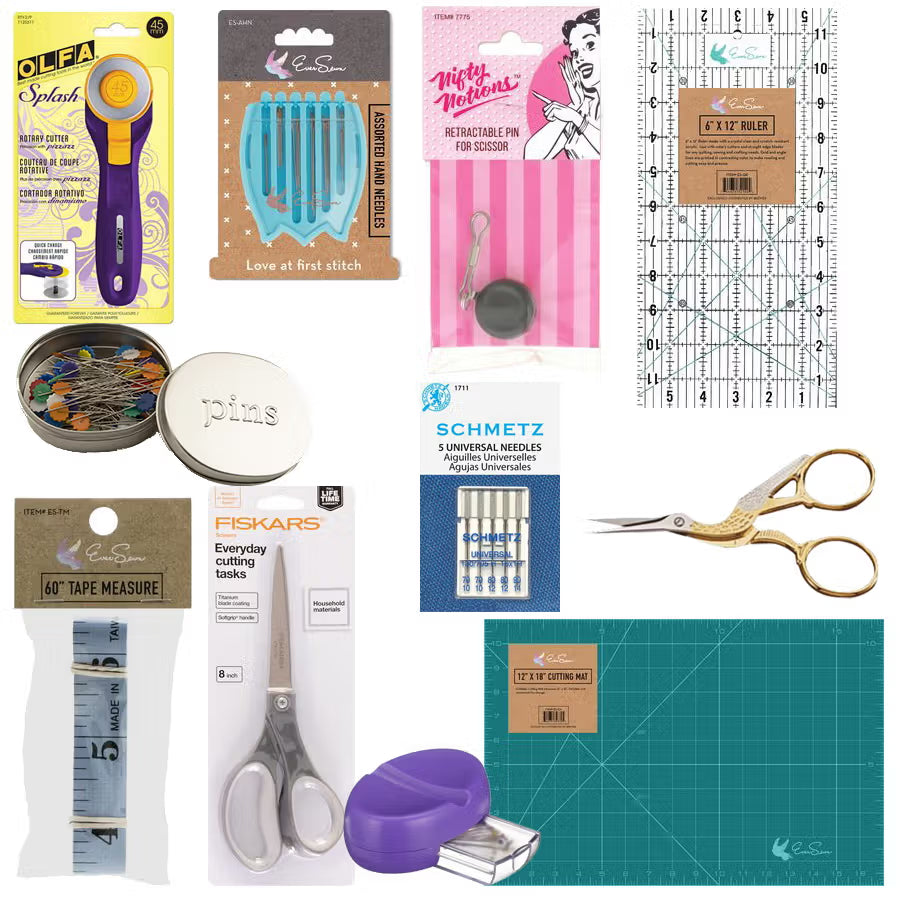 Collection of sewing and crafting tools including scissors, needles, and rulers