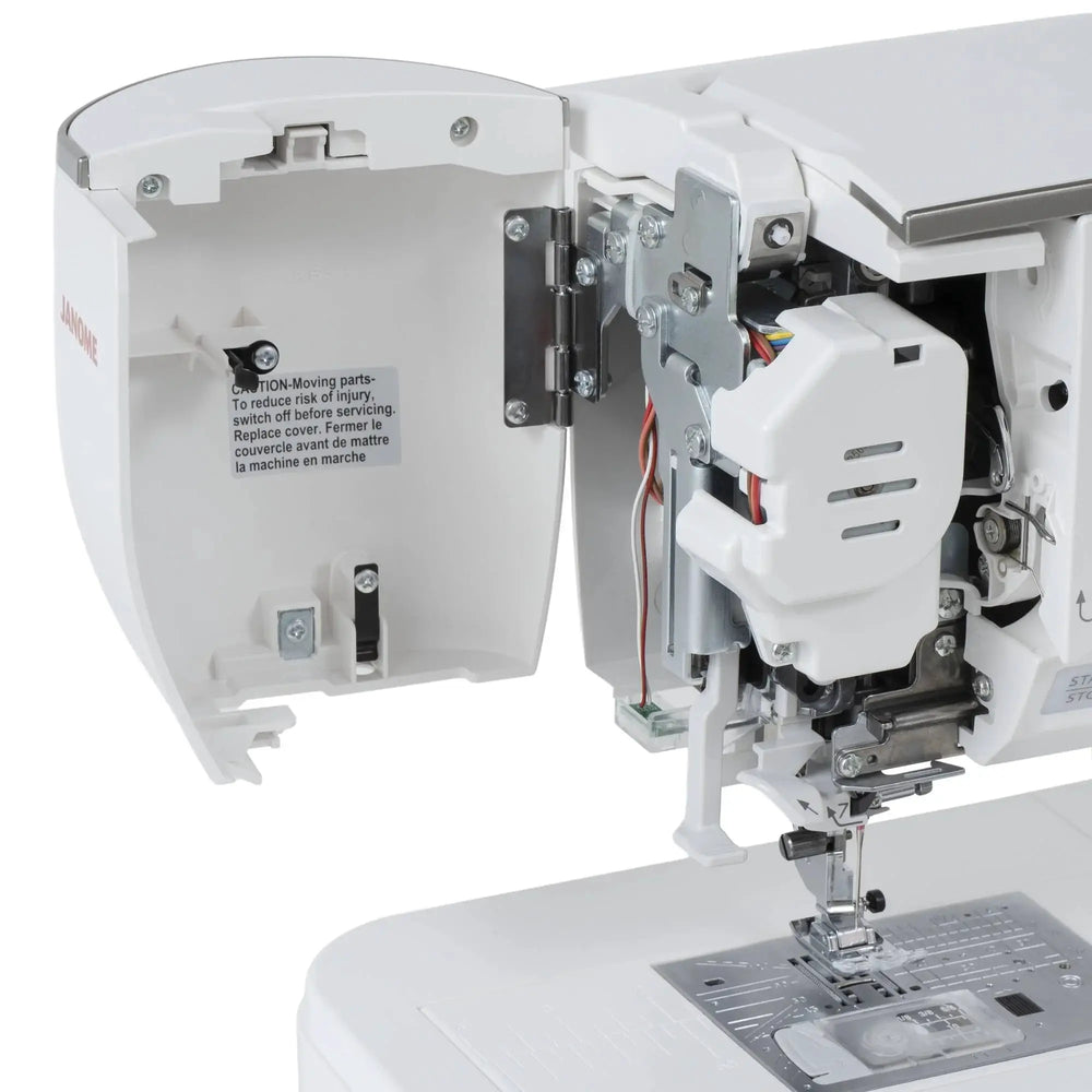 Janome Skyline 8 sewing and quilting machine, computerized, white exterior with open housing showing components.