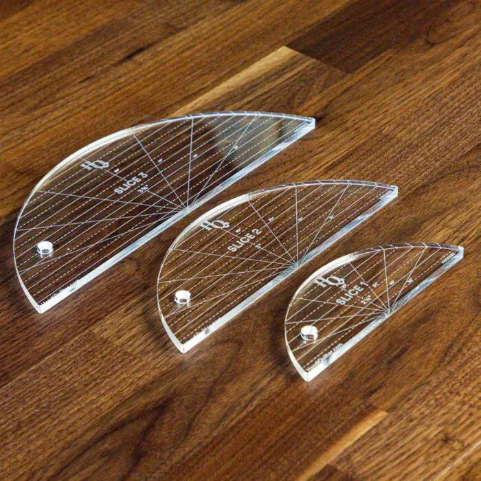 Handi Quilter Slice Set of 3 rulers; clear acrylic quilting rulers with grid lines.