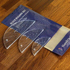 Handi Quilter Slice Set (3) quilting rulers; three clear plastic arc rulers with white measurement marks