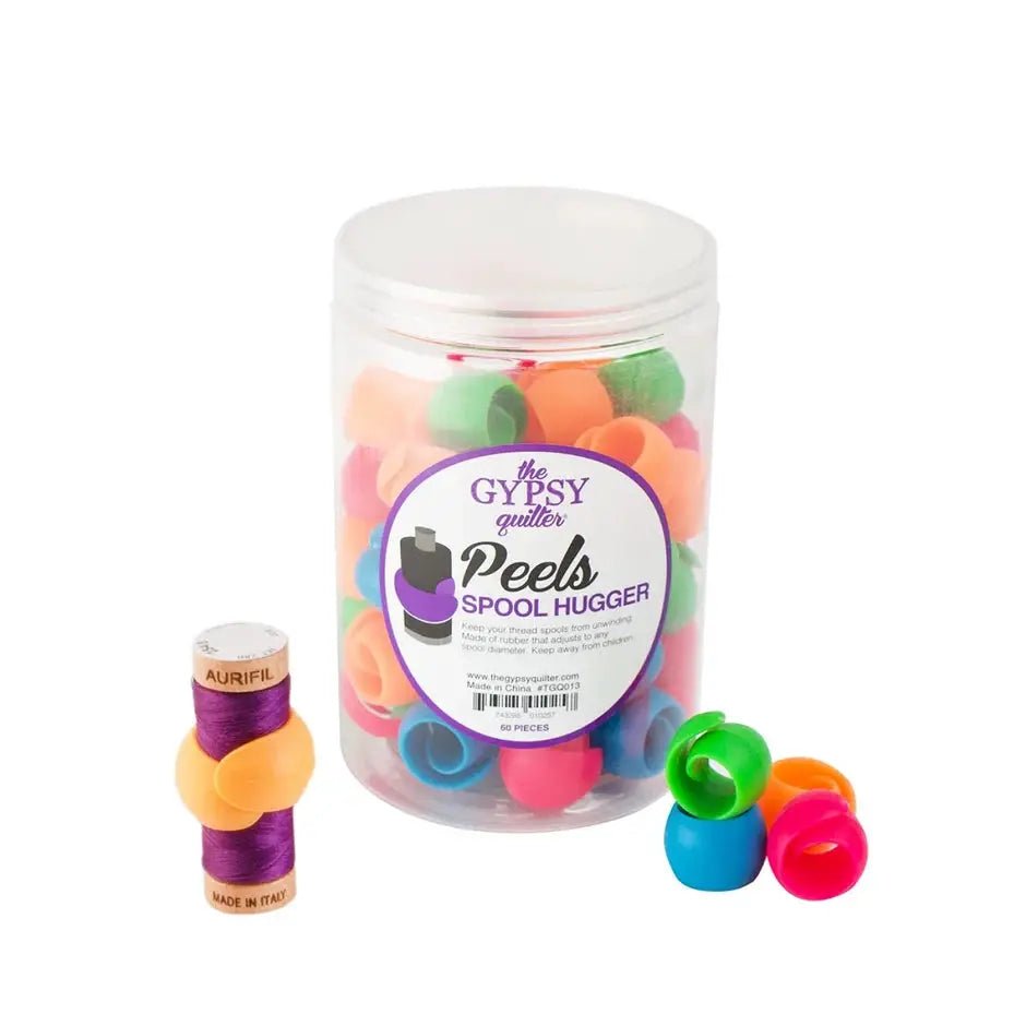 Gypsy Quilter Peels Spool Hugger thread storage jar with 60 colorful plastic spool covers