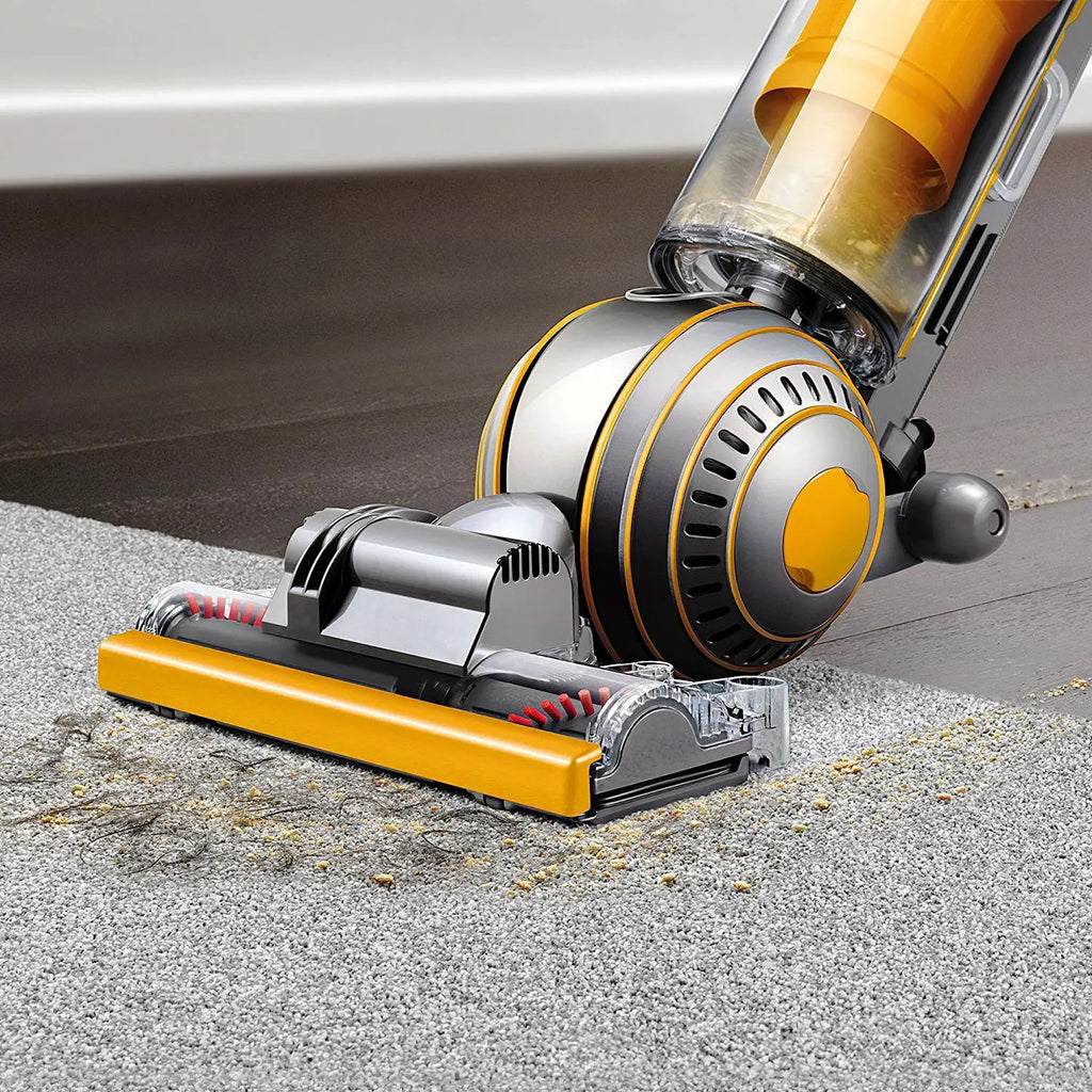 Dyson Ball Multifloor II UP19MF vacuum on carpet; yellow and gray ball design