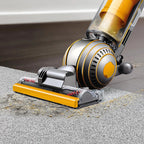 Dyson Ball Multifloor II UP19MF vacuum on carpet; yellow and gray ball design