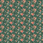 Riley Blake Porch Swing velvet fabric with pink and coral floral bouquets, small white flowers, and leaves on a green background.
