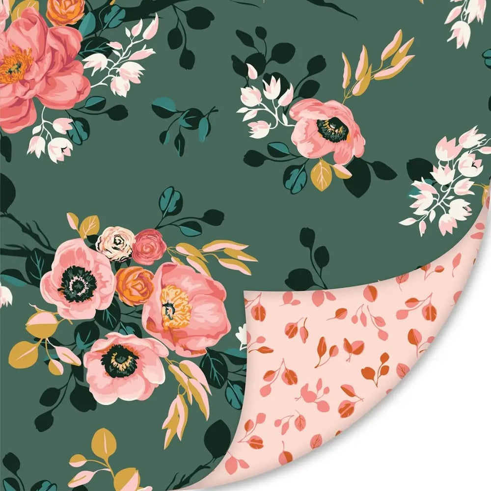 Riley Blake Porch Swing velvet fabric with pink and coral floral bouquets, small white flowers, and leaves on a green background.
