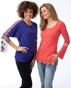 Touch of Lace tops in blue and coral with lace-trim details worn by two women