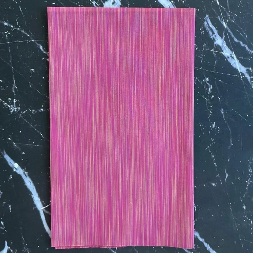 Space Dye Berry yarn-dyed woven cotton fabric with berry, raspberry, magenta, and pink vertical tonal texture.
