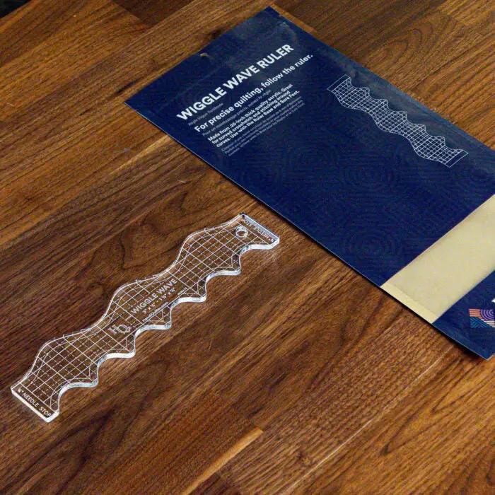 Handi Quilter Wiggle Wave ruler, clear acrylic quilting ruler with a wavy edge