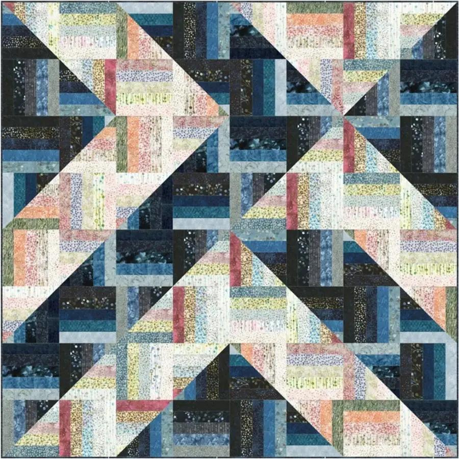 A Quilter's Dream Rockin Rail Fence quilt fabric kit with blue, pink, and neutral prints.