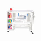 Arrow Mod Sewing Cabinet, white modular cabinet on wheels with built-in sewing machine and left spool storage.