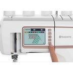 Husqvarna Viking Amber Air S600 Coverlock - Sewingmachinesplus.com