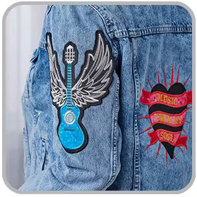 Denim jacket with guitar and wings patch 