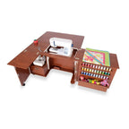 Kangaroo Wallaby II Studio sewing cabinet in teak with air lift; includes Dingo II and visible thread spools.
