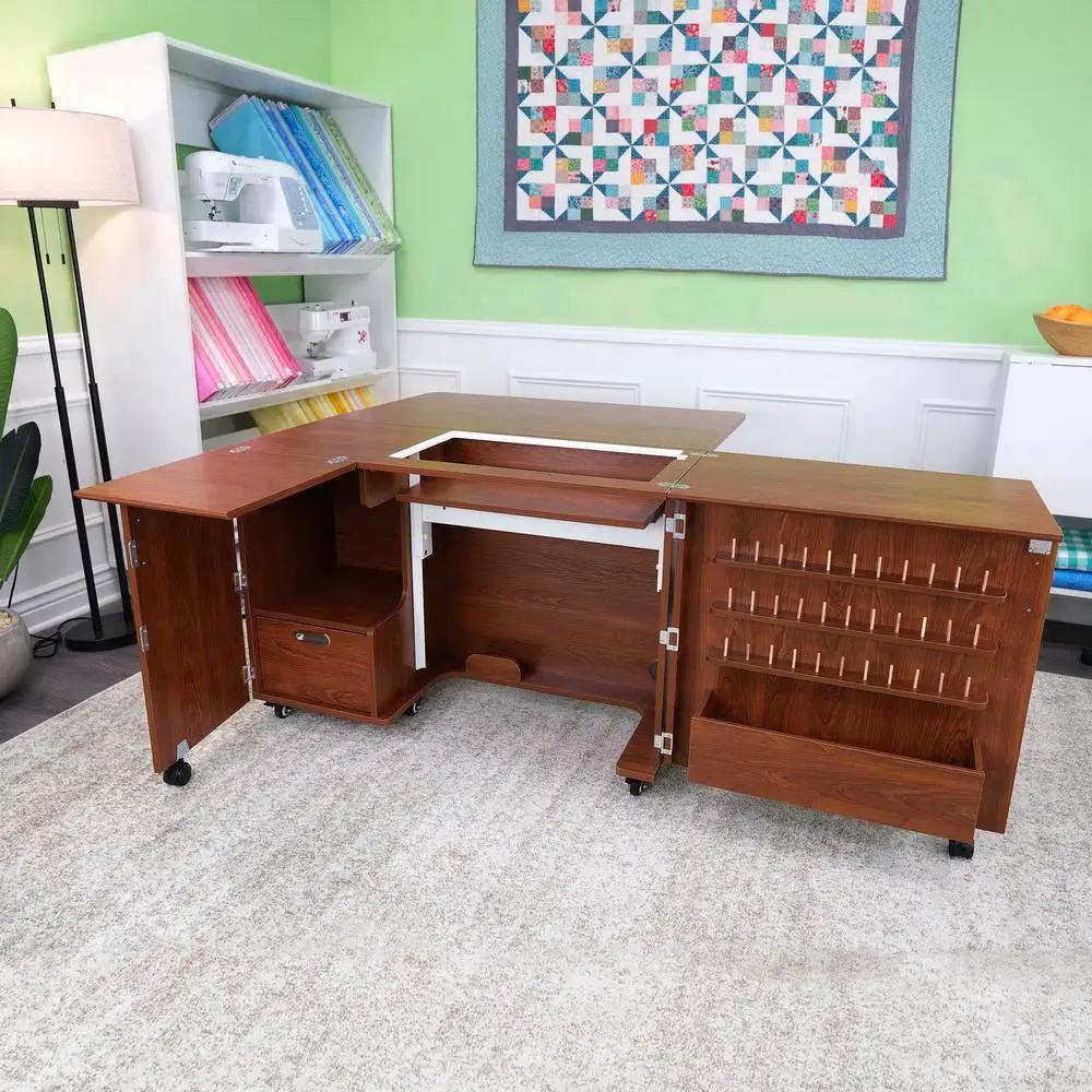 Sewing cabinet set by Kangaroo Sewing Furniture in teak; Wallaby II Studio on wheels with drawers and thread racks