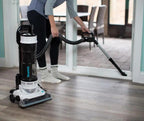 Simplicity S20PET Symmetry bagless upright vacuum, black and white on hardwood floor