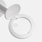 Daylight Halo LED Table Magnifier, white round magnifying lamp with hinged lid