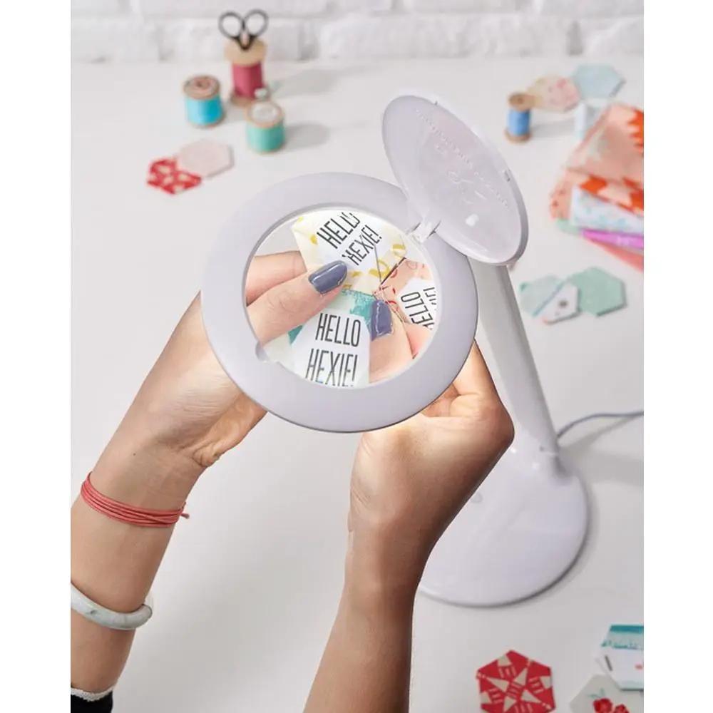 Daylight Halo LED table magnifier, white desk lamp with circular magnifying lens