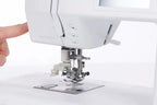 Bernette B57 sewing machine in white; close-up of presser foot and needle area
