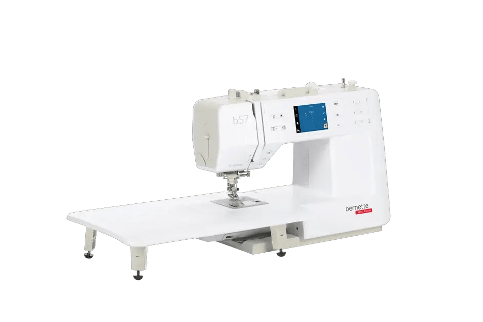 Bernette B57 sewing machine on white extension table with touchscreen display, Bernina brand